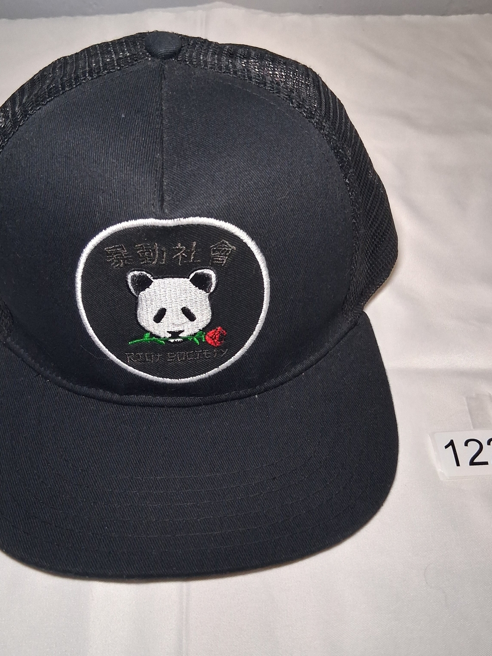 riot society Black Mesh Panda Patch Trucker Hat with Red Rose